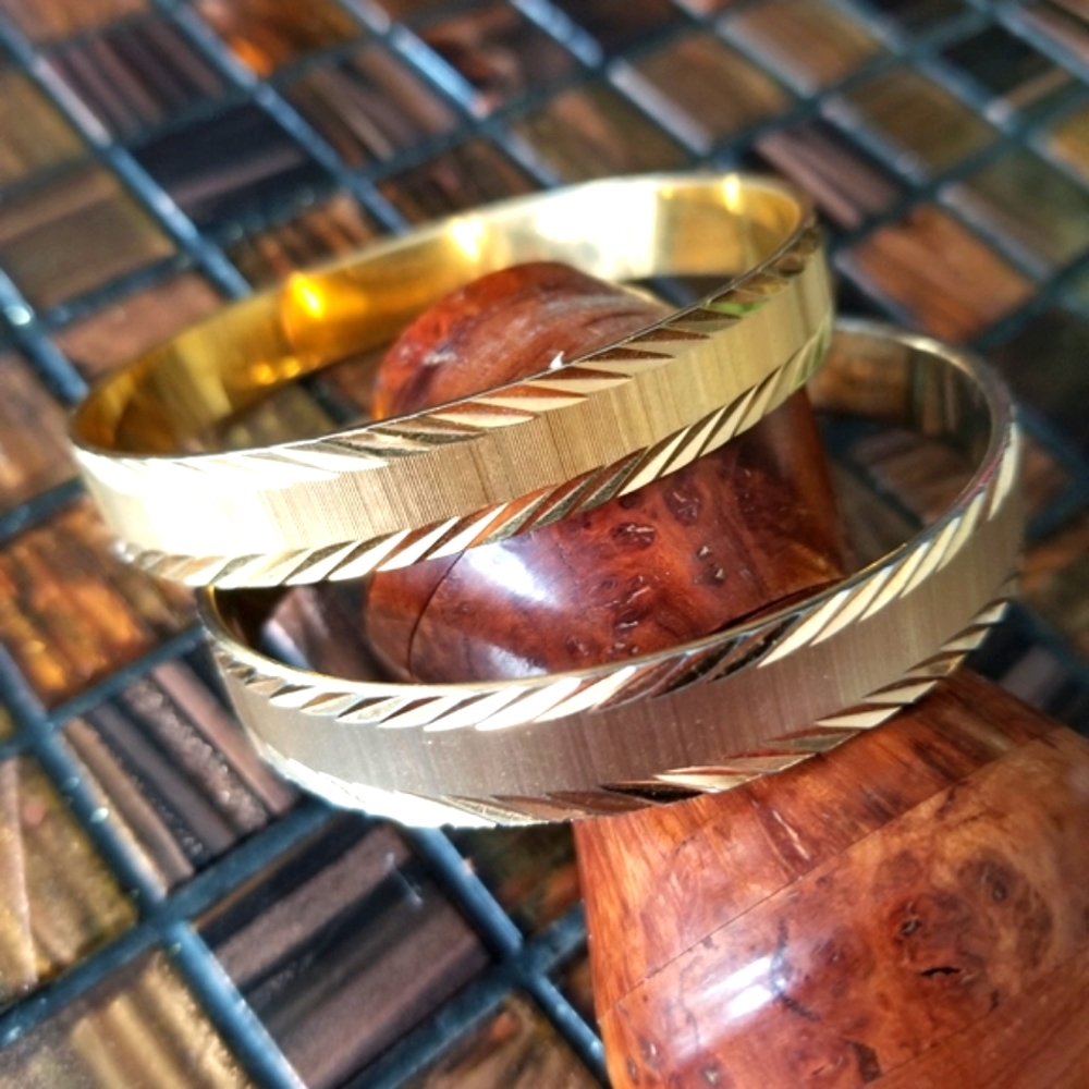 VINTAGE MONET Gold-tone Etched Bangle Bracelets. Signed.
